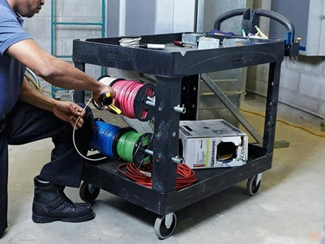 Man using Rubbermaid Utility Cart