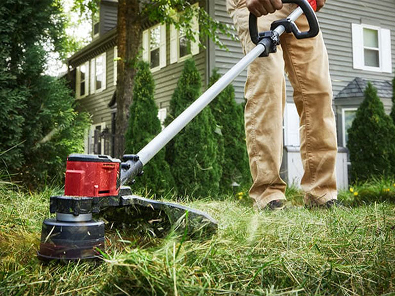 Weed Eater in use