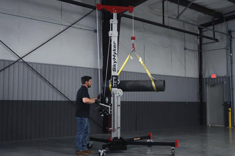 Man uses SkyHyker Material Lift to move pipe